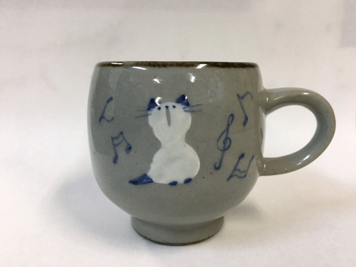 手描きの猫のマグカップ